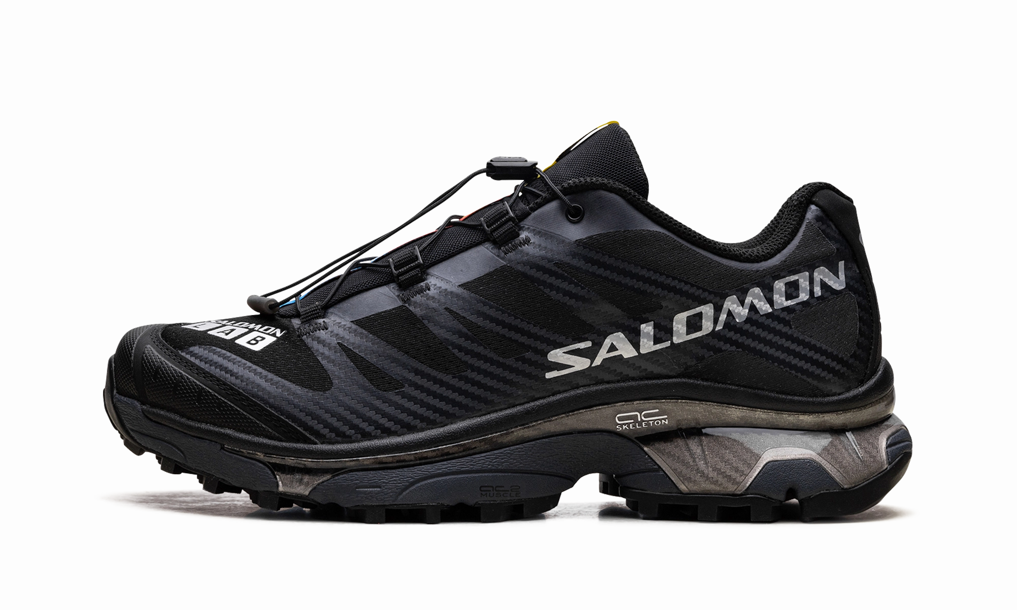 running in a frozen lake area shoes Salomon XT-4 OG "Black Silver Metallic"
