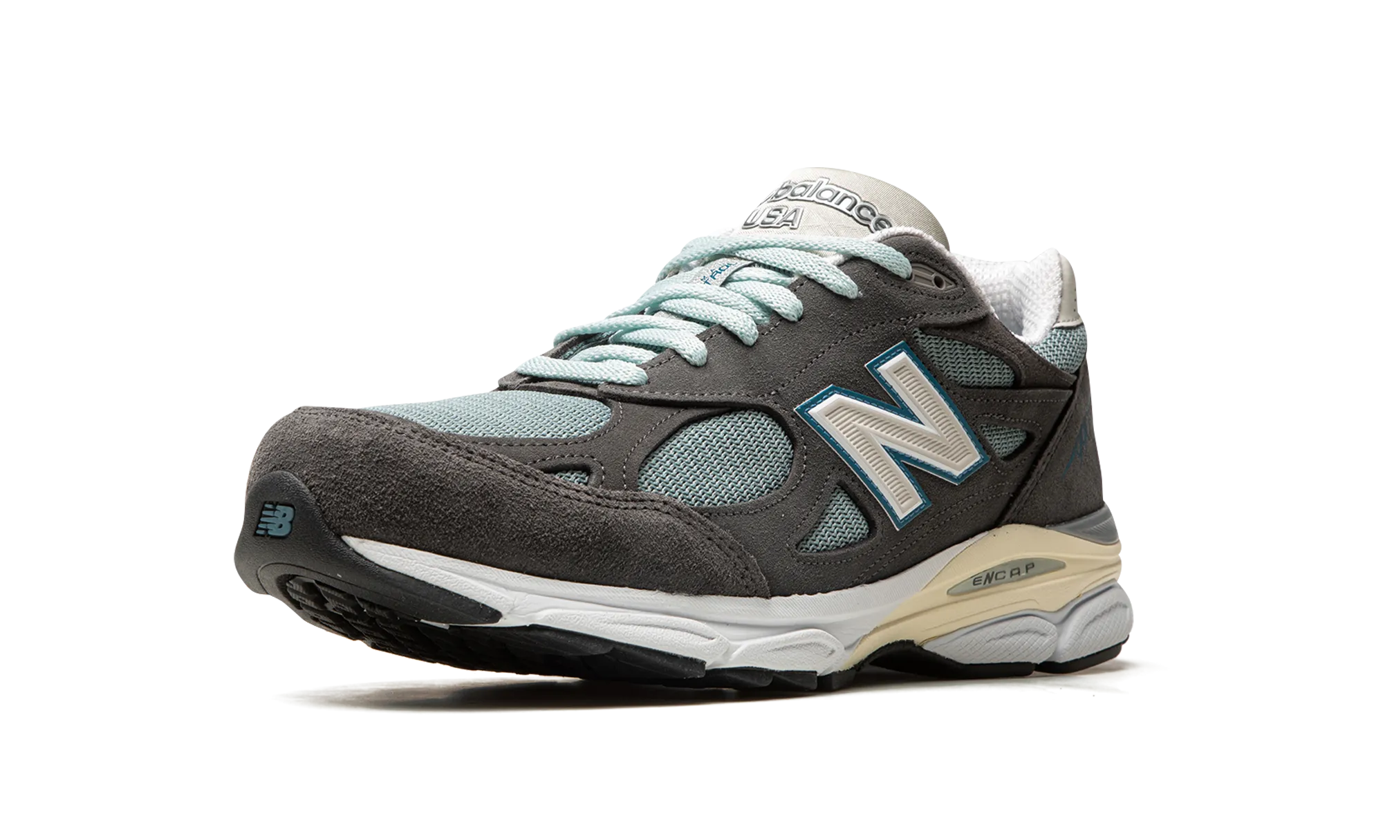 990 v3 "Kith - Steel Blue / Grey" running alone running in a charity run shoes