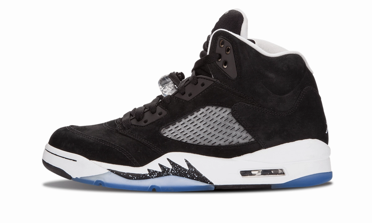 Air Jordan 5 Retro "Oreo" running during a windy day sports - themed shoes
