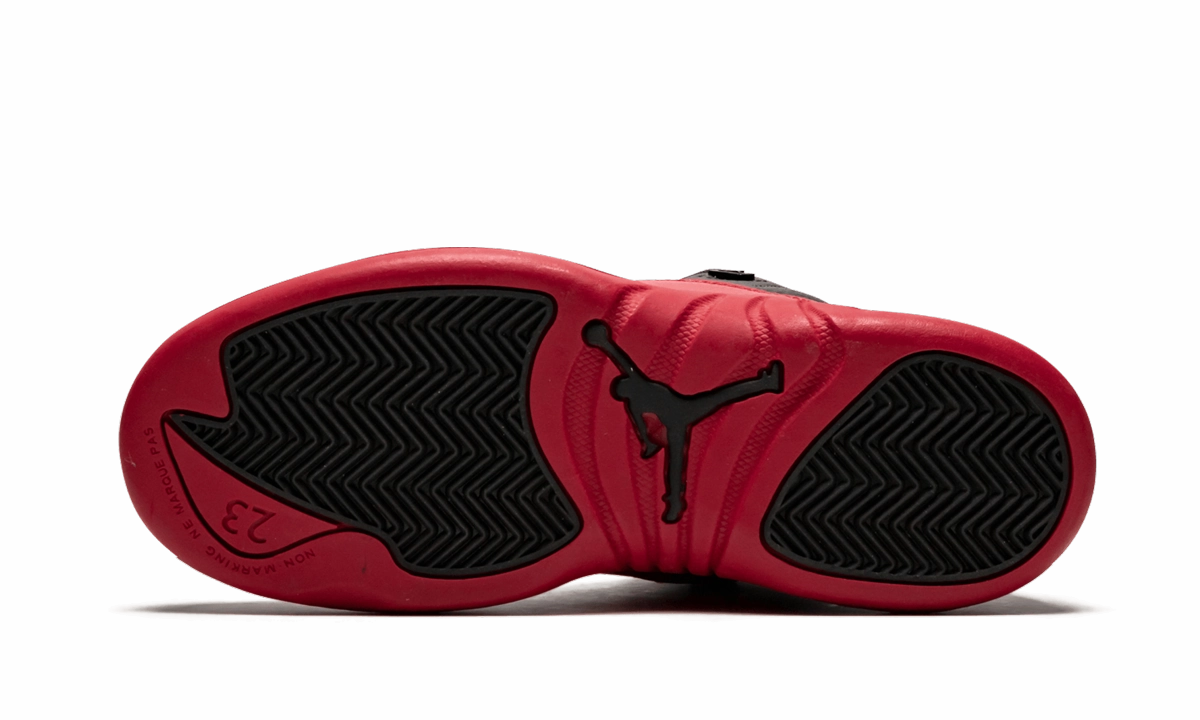 Jordan 12 Retro PS "Flu Game" running in dark colors
