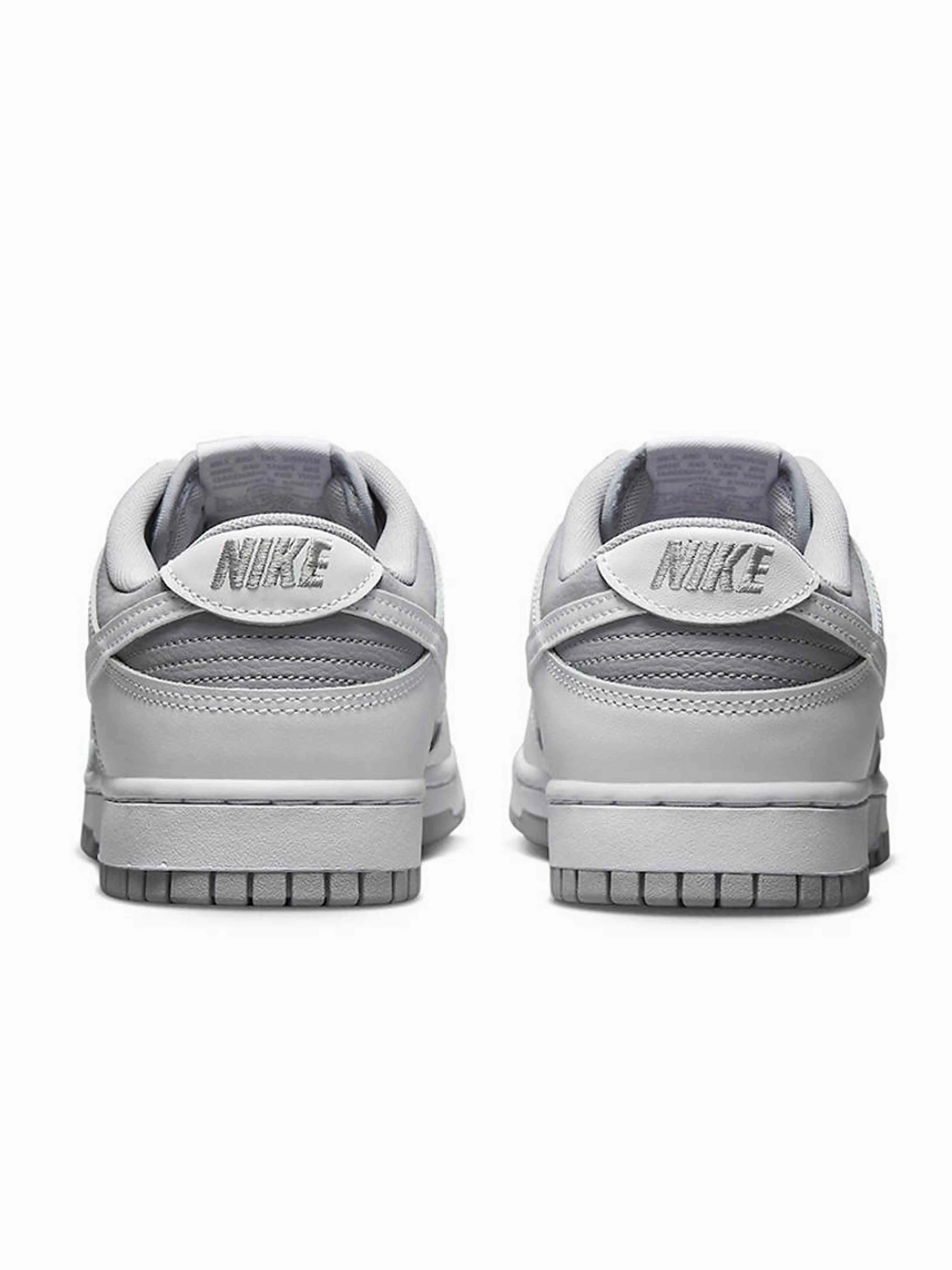 Nike Dunk Low Retro White Grey running during sunrise