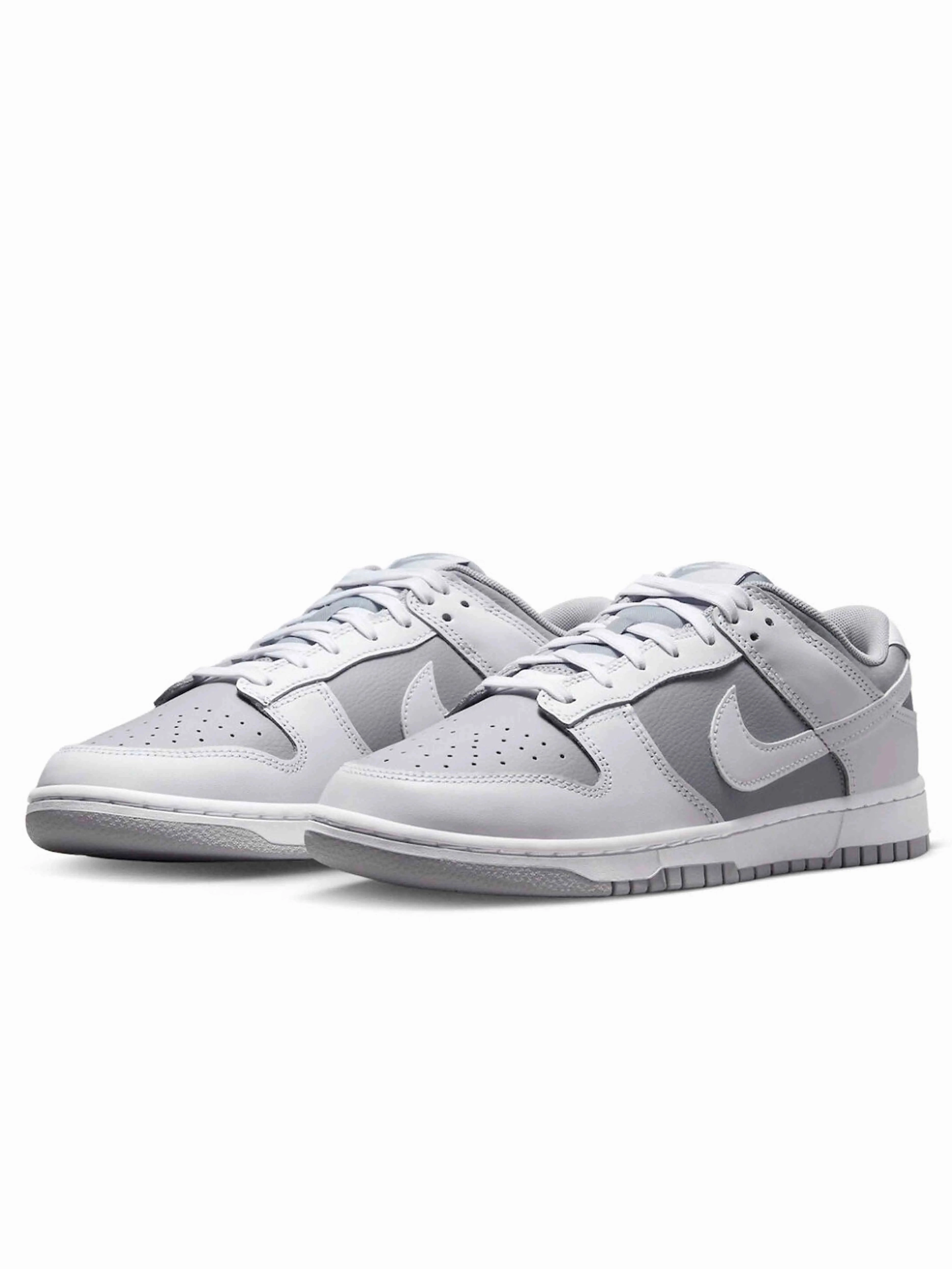 running in a monorail station area shoes Bright Colors Nike Dunk Low Retro White Grey