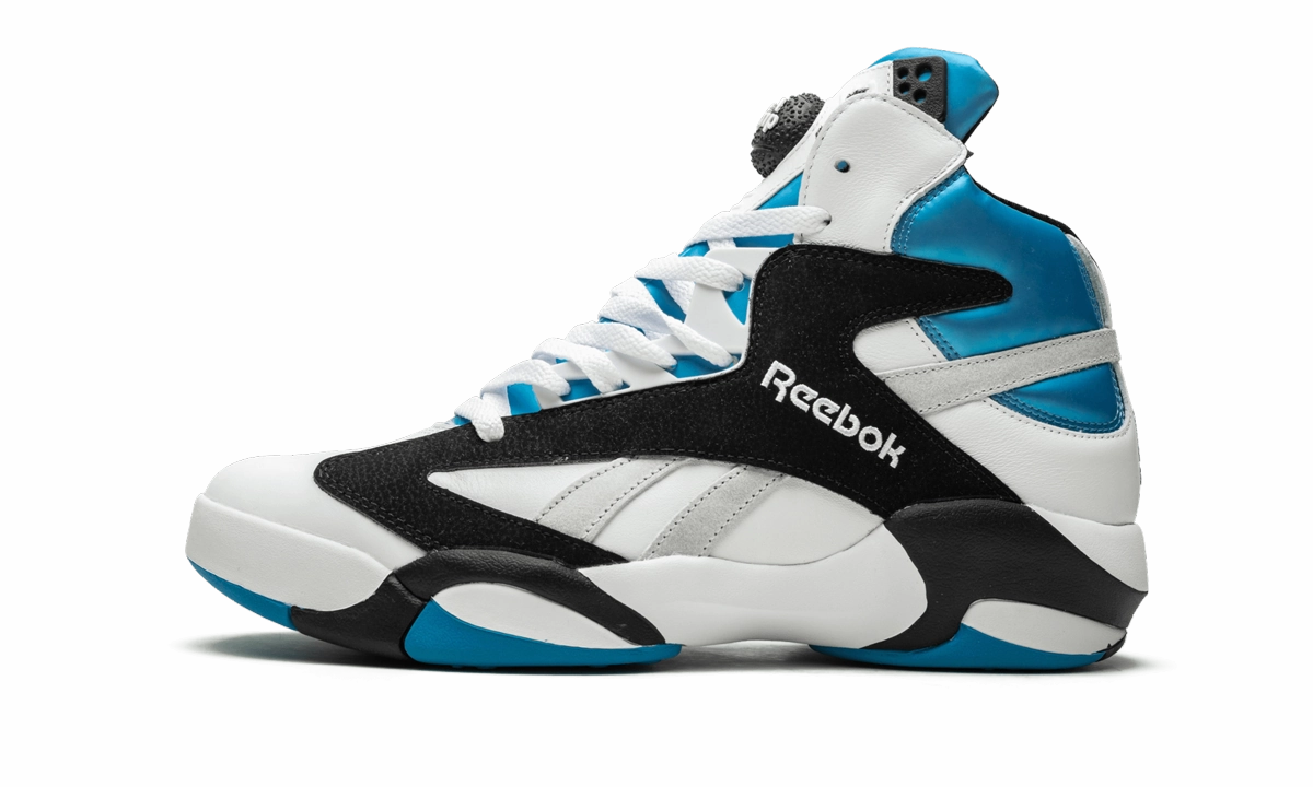 Shaq Attaq running on a track oval