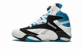 Shaq Attaq running on a track oval