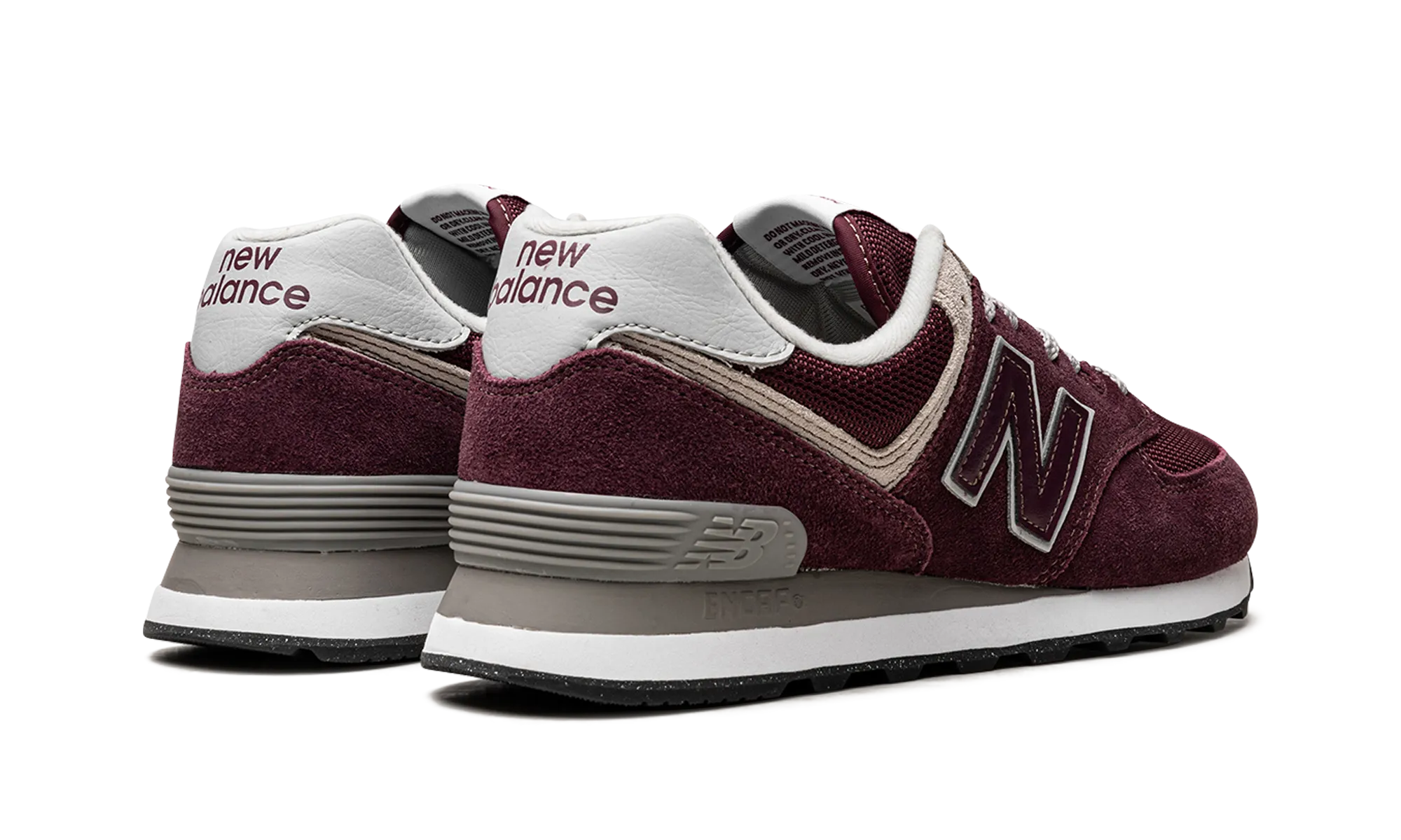 574 "Burgundy" running in an iconic bridge area shoes