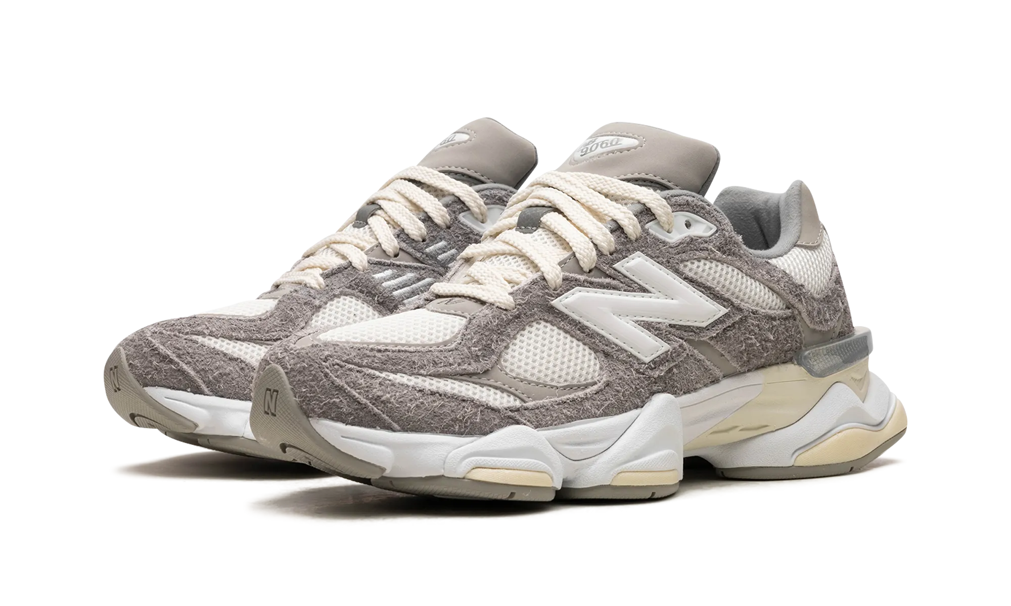 9060 "Grey / White" running in a gulf area shoes