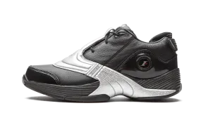 Answer 5 OG "Black / Silver" running in a fumarole area shoes
