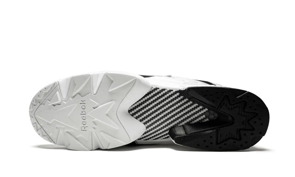 Instapump Fury OB running in a suburban area shoes