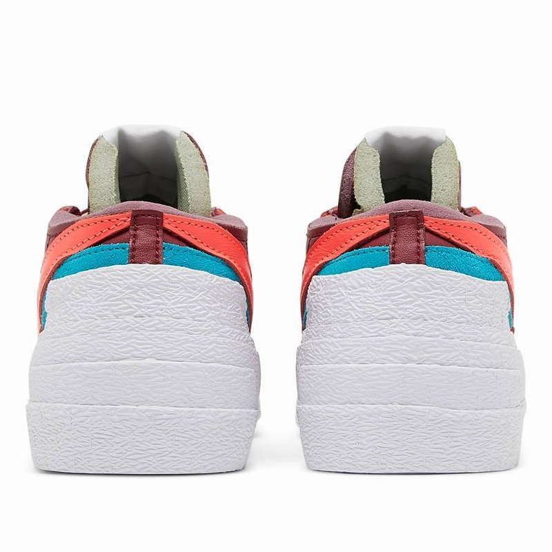 running in a lava field area shoes banked track running option KAWS x sacai x Blazer Low Team Red