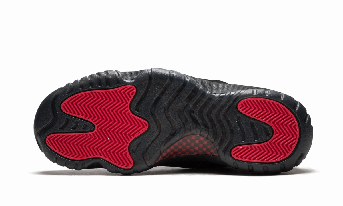 Air Jordan 11 Retro Low "Referee" running in a sidewalk area shoes