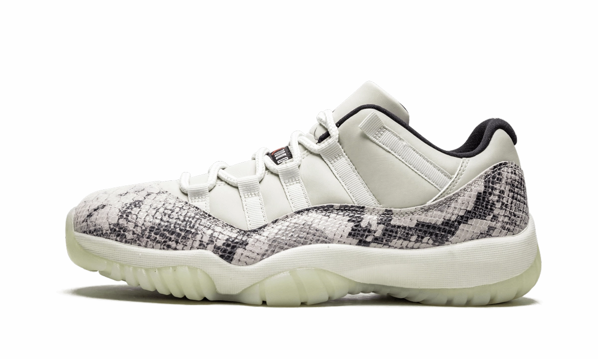 running on an indoor track shoes Air Jordan 11 Retro Low "Snakeskin Light Bone"