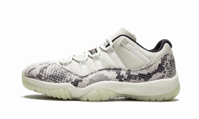 running on an indoor track shoes Air Jordan 11 Retro Low "Snakeskin Light Bone"
