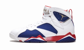 Air Jordan 7 Retro "Tinker Alternate" running with a backpack