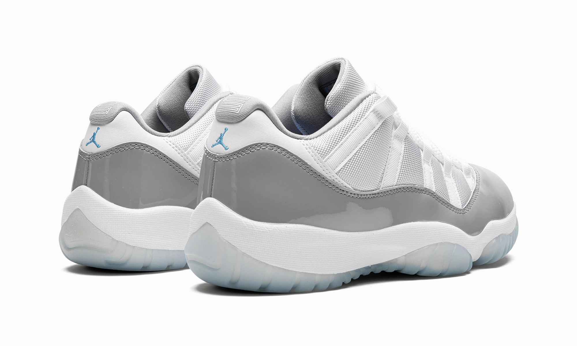 Air Jordan 11 Low "White Cement" running with music