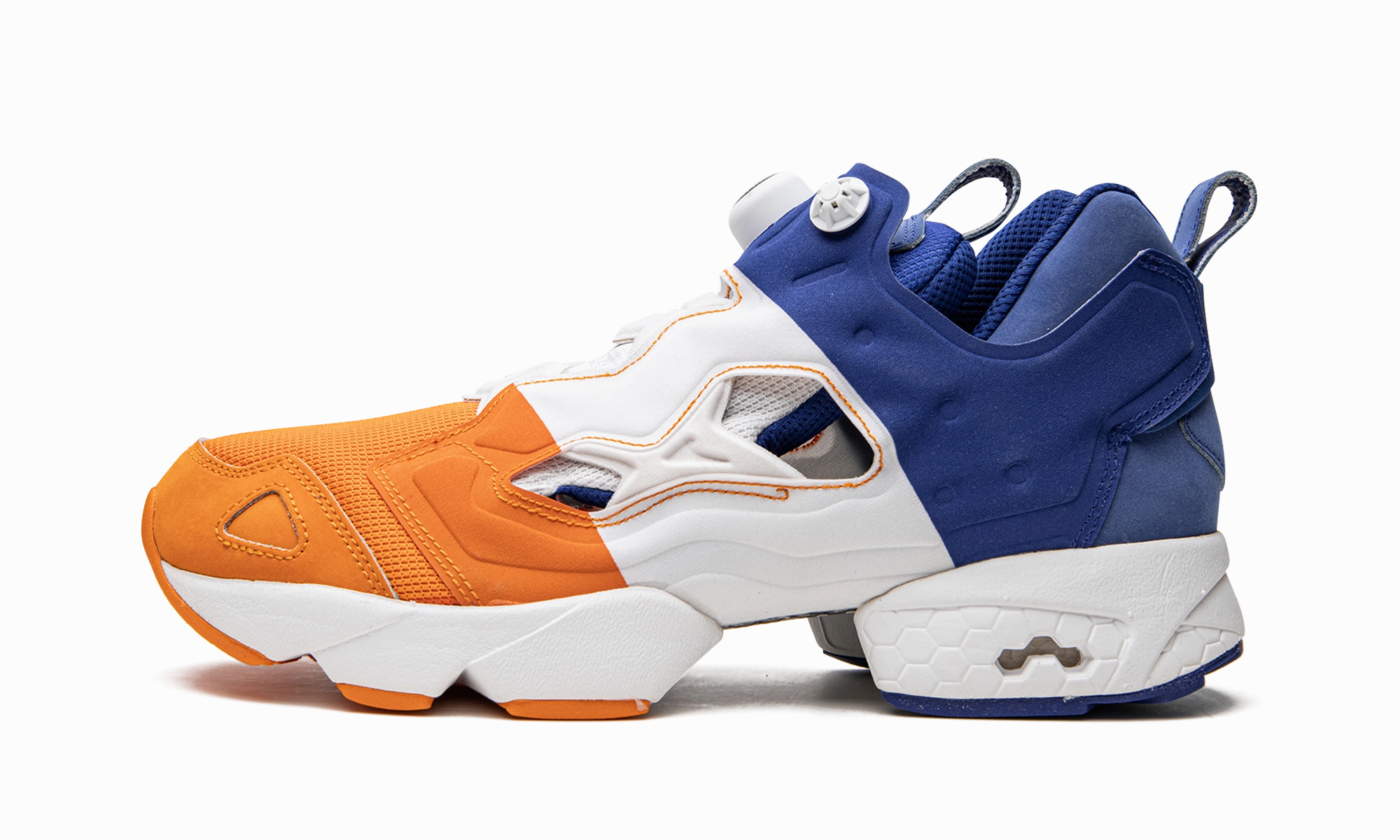 Pump Fury "SNS" embossed running shoes running on an indoor track shoes