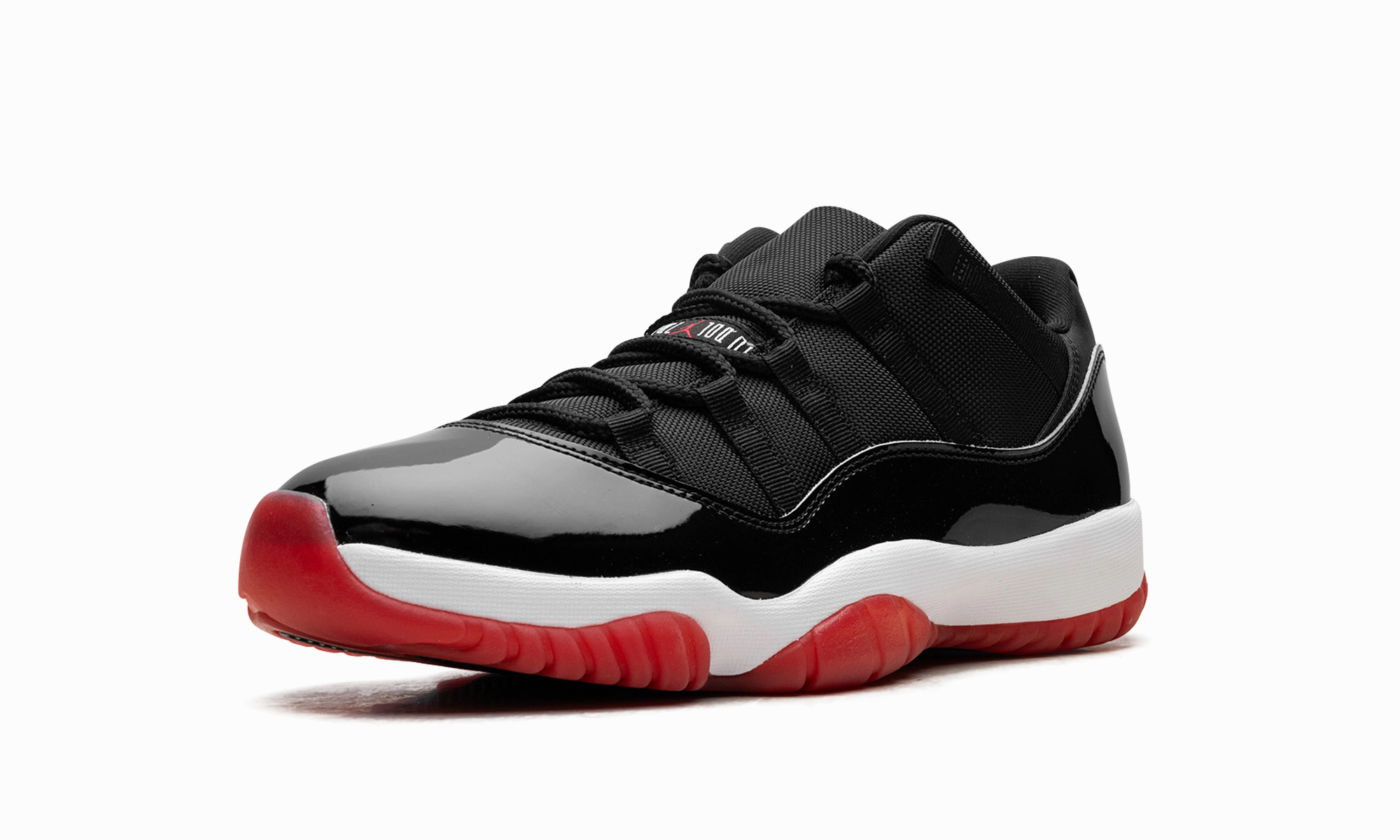 running in a concrete bridge area shoes long - distance running Air Jordan 11 Retro Low "Bred (2025)"