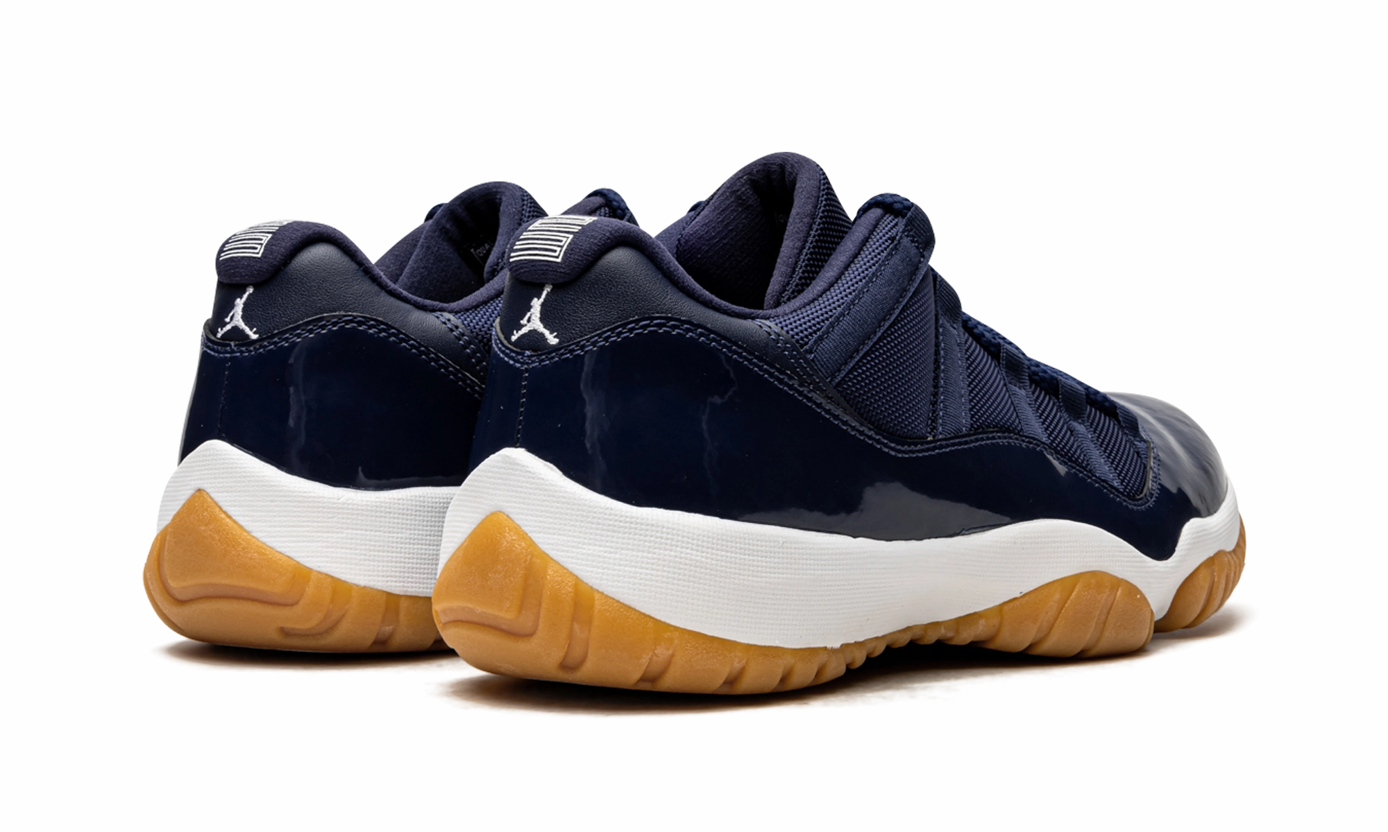 Air Jordan 11 Retro Low "Navy/Gum" running for school events