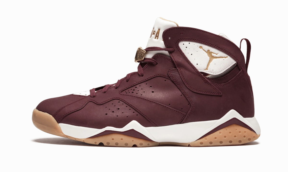 Air Jordan 7 Retro C&C "Cigar" running in a glass bridge area shoes