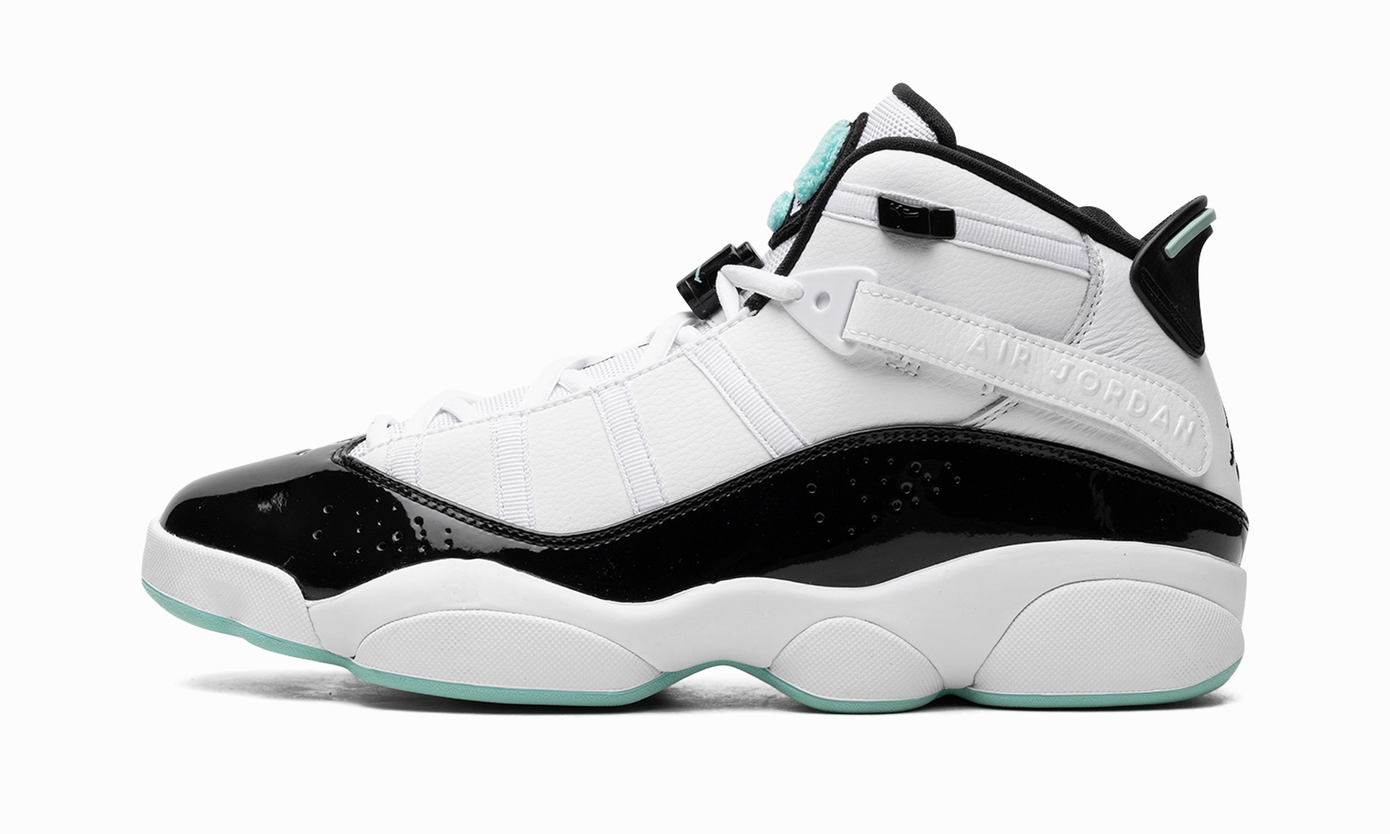 Jordan 6 Rings "Tropical Twist" running on concrete